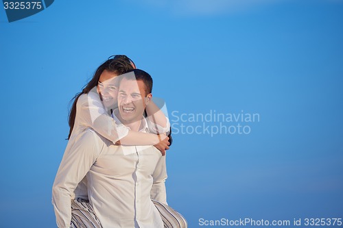 Image of happy young romantic couple have fun arelax  relax at home
