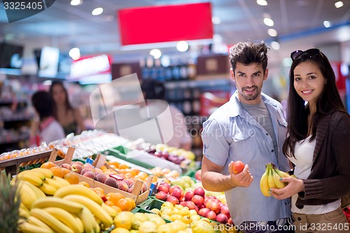 Image of couple shopping in a supermarket