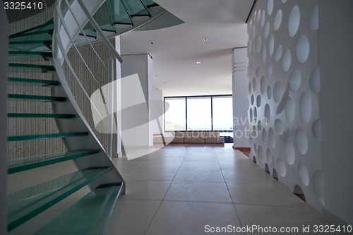 Image of modern glass spiral staircase