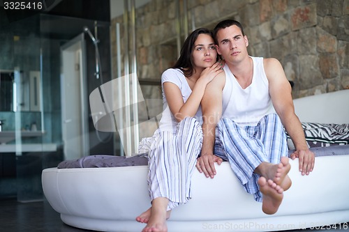 Image of couple relax and have fun in bed