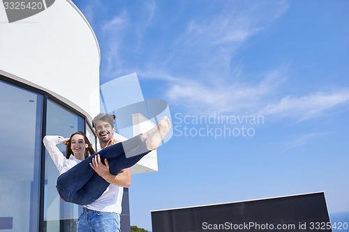 Image of happy young romantic couple have fun arelax  relax at home