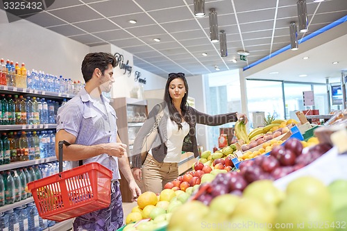 Image of couple shopping in a supermarket