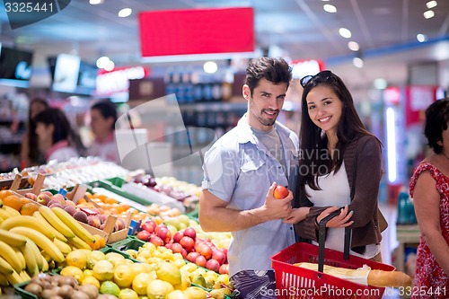 Image of couple shopping in a supermarket