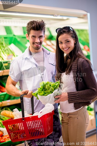 Image of couple shopping in a supermarket