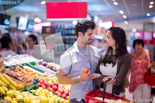 Image of couple shopping in a supermarket