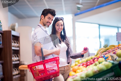 Image of couple shopping in a supermarket