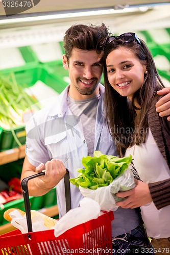 Image of couple shopping in a supermarket