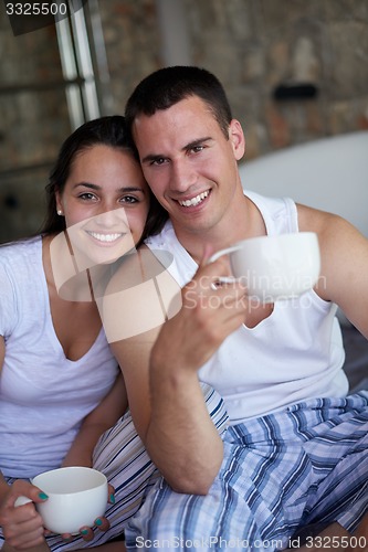 Image of couple relax and have fun in bed