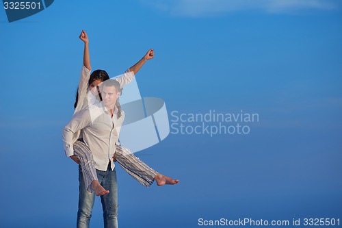 Image of happy young romantic couple have fun arelax  relax at home