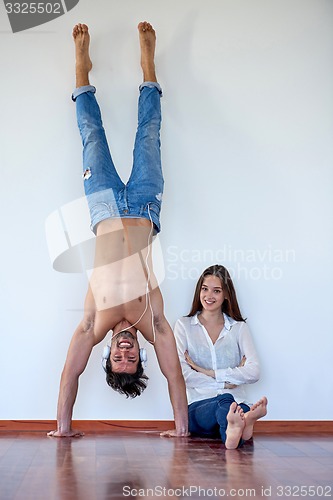 Image of happy young romantic couple have fun arelax  relax at home