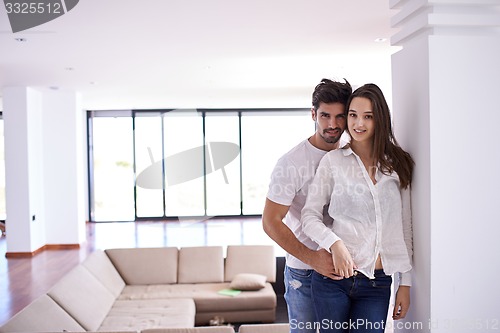 Image of relaxed young couple at home