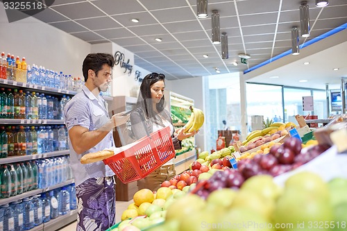 Image of couple shopping in a supermarket