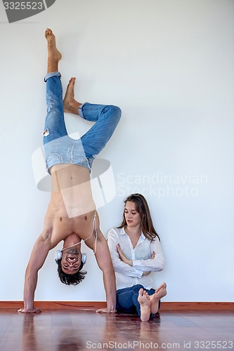 Image of happy young romantic couple have fun arelax  relax at home