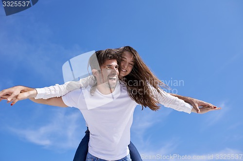 Image of happy young romantic couple have fun arelax  relax at home