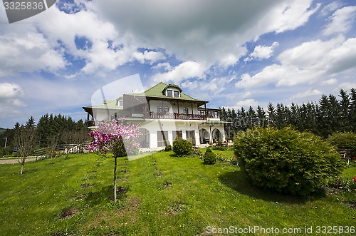 Image of House with green garden