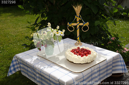 Image of Homemade cake at a decorated table