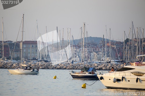 Image of Boats anchored at sunset in Adriatic sea