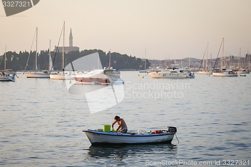 Image of Anchored motor boat in Adriatic sea