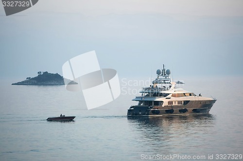 Image of Yacht sailing in Adriatic sea at sunset