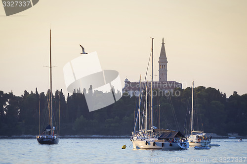 Image of Sailboats in front of Saint Eufemia church