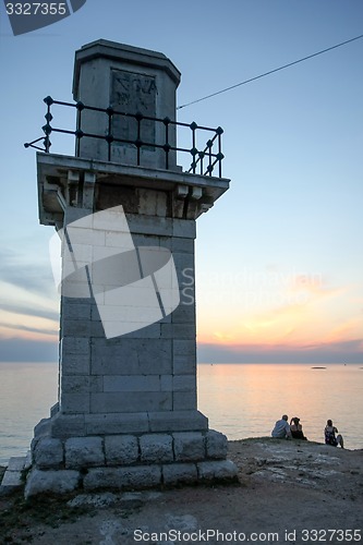 Image of Tourists watching sunset in Rovinj