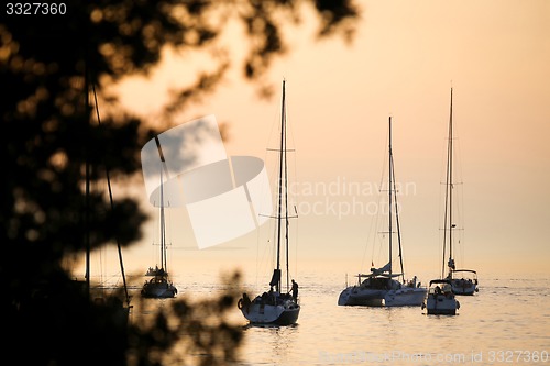 Image of Sailboats in Adriatic sea at sunset