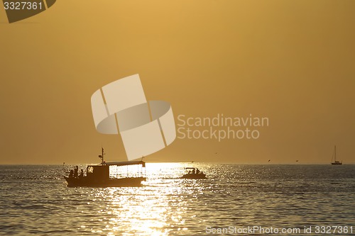 Image of Boats at sunset