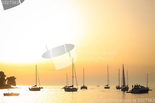 Image of Sailboats anchored at sunset in Adriatic sea