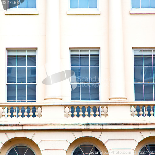 Image of old windon in england london brick and glass the wall 