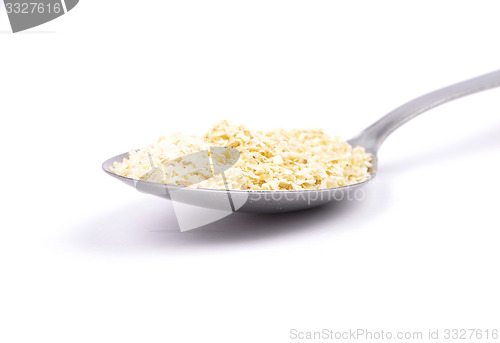 Image of Millet flakes on spoon