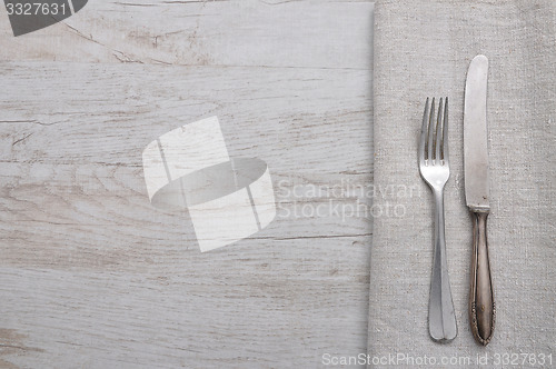 Image of Old cutlery on cloth