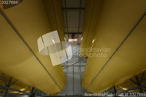 Image of Industrial interior with welded silos