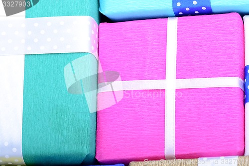 Image of bright gifts with ribbons, holiday invitation card