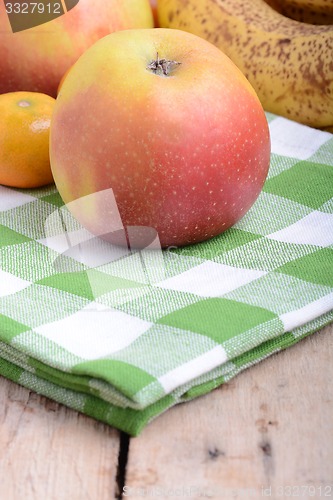 Image of mandarin, bananas and apples, fresh food close up