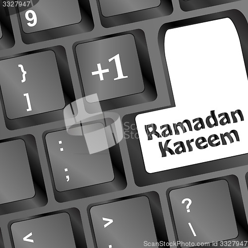 Image of Computer keyboard with ramadan kareem word on it