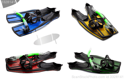 Image of Set of multicolor swim fins, mask and snorkel for diving on whit