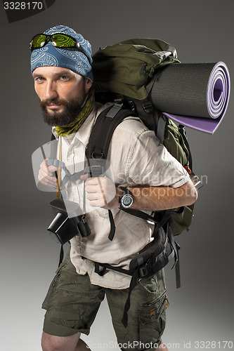 Image of Portrait of a male fully equipped tourist 