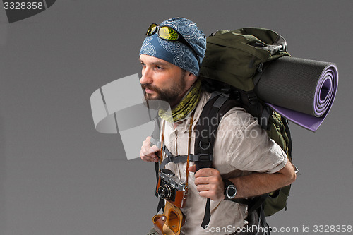 Image of Portrait of a male fully equipped tourist 