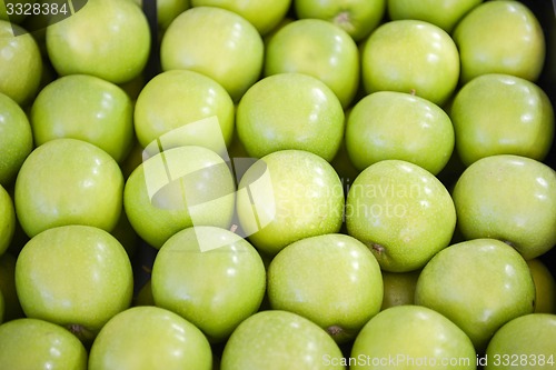 Image of neatly folded green apples