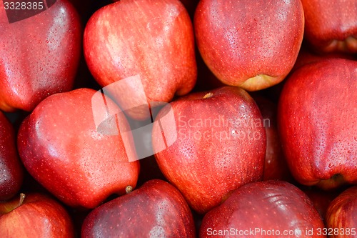 Image of neatly folded red apples
