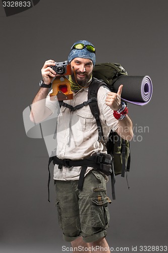 Image of tourist with camera