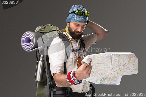 Image of Portrait of a male fully equipped tourist 