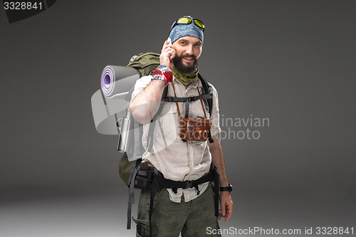 Image of Portrait of a male fully equipped tourist 