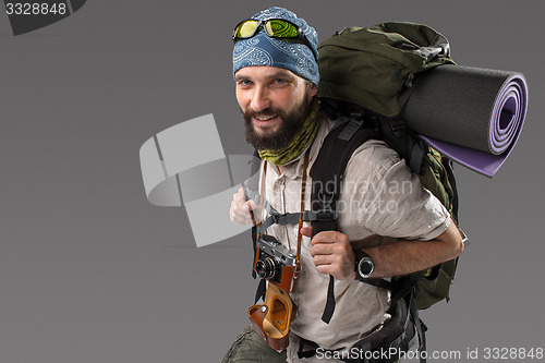 Image of Portrait of a male fully equipped tourist 