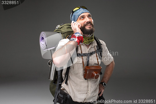 Image of Portrait of a male fully equipped tourist 