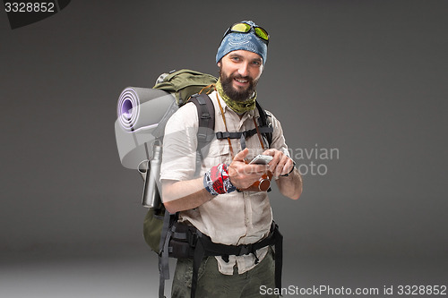 Image of Portrait of a male fully equipped tourist 