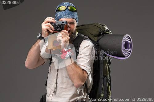 Image of tourist with camera