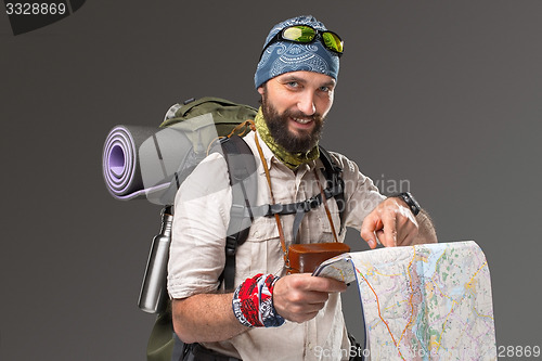 Image of Portrait of a male fully equipped tourist 