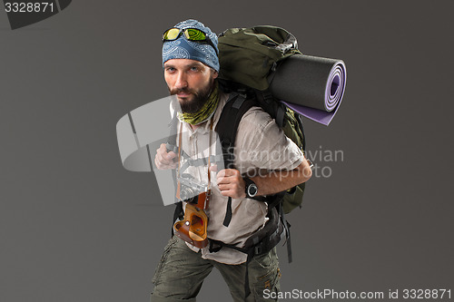 Image of Portrait of a male fully equipped tourist 