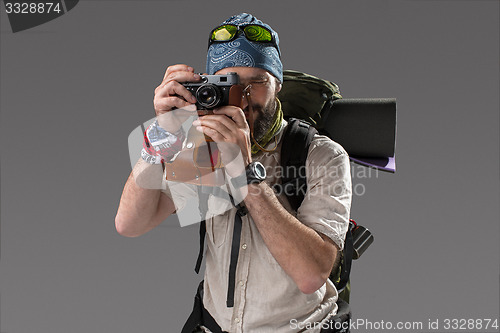 Image of tourist with camera